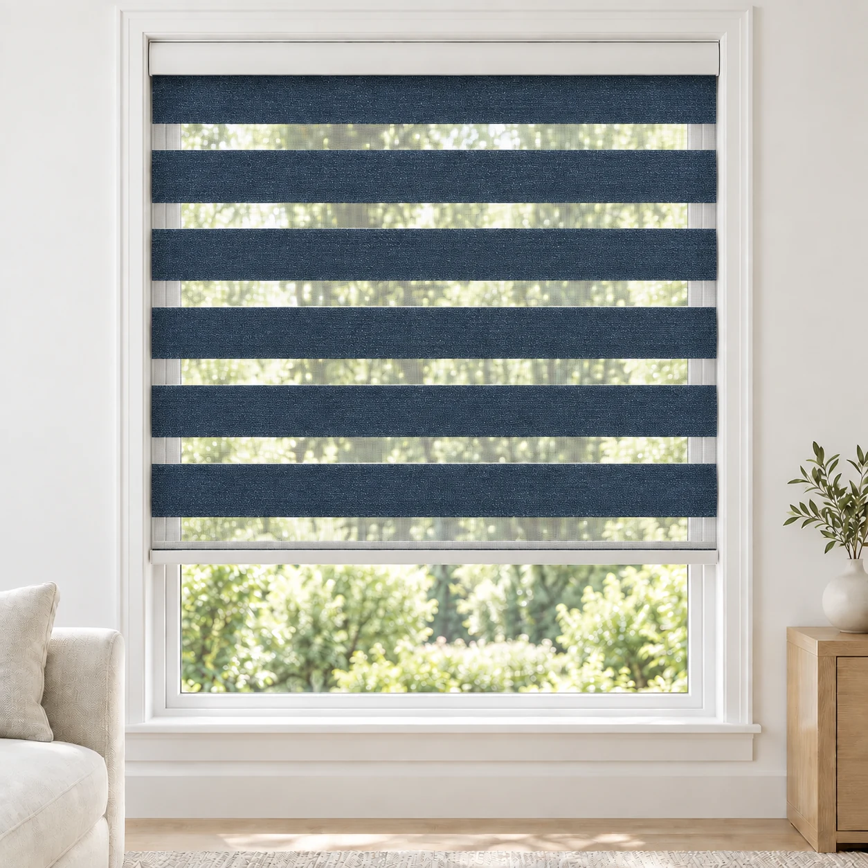Blue Charcoal PEACEWIDE standard zebra blind with alternating fabric and sheer bands in a bright living room, PEACEWIDE-CHARCOAL-LF