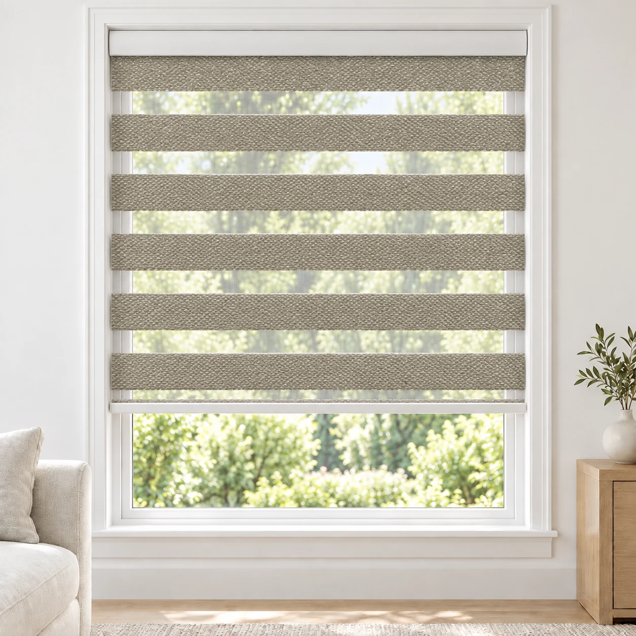 Sand Beige ROSELLE standard zebra blind with alternating fabric and sheer bands in a bright living room, ROSELLE-BEIGE-BO