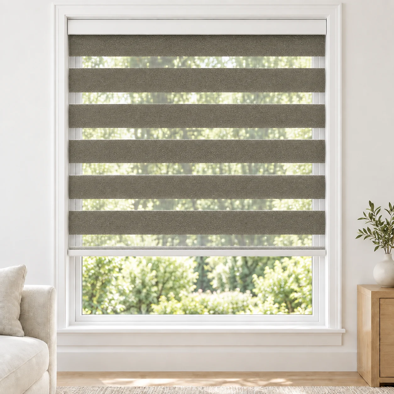 Taupe ROSELLE standard zebra blind with alternating fabric and sheer bands in a bright living room, ROSELLE-TAUPE-BO