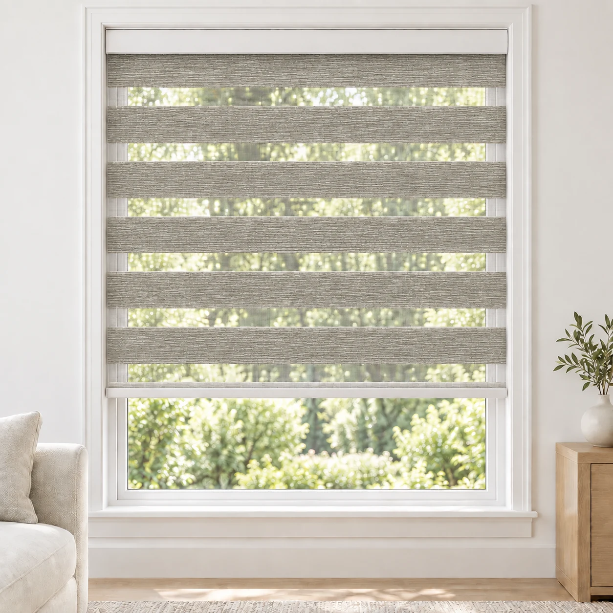 Silver Mist Rossini standard zebra blind with alternating fabric and sheer bands in a bright living room, Rossini-05-DO