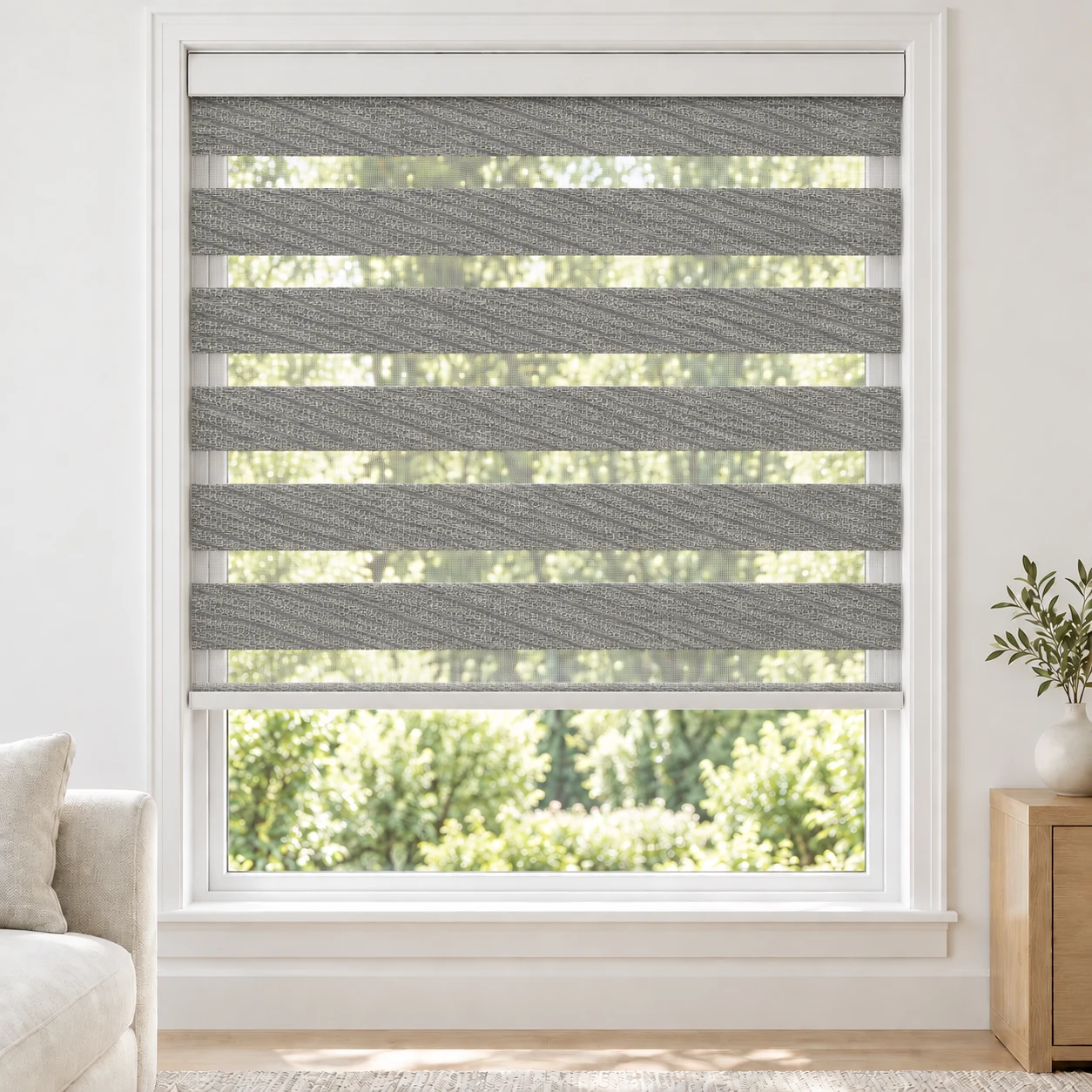 Stone Grey SEDONA standard zebra blind with alternating fabric and sheer bands in a bright living room, SEDONA-GREY-LF